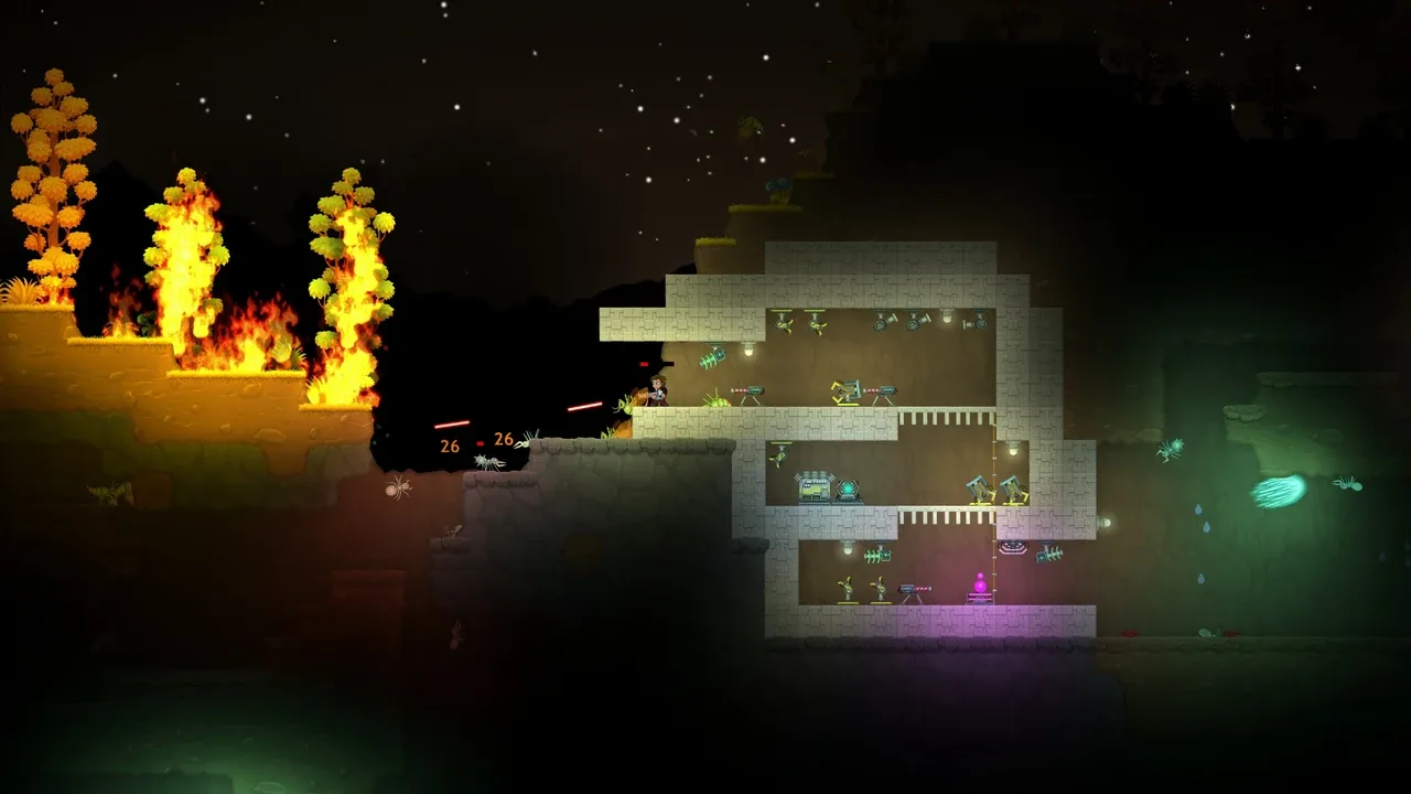 A night-time screenshot from Dig or Die showing a player defending a multi-level fortified base against attacking creatures, with fires burning outside.