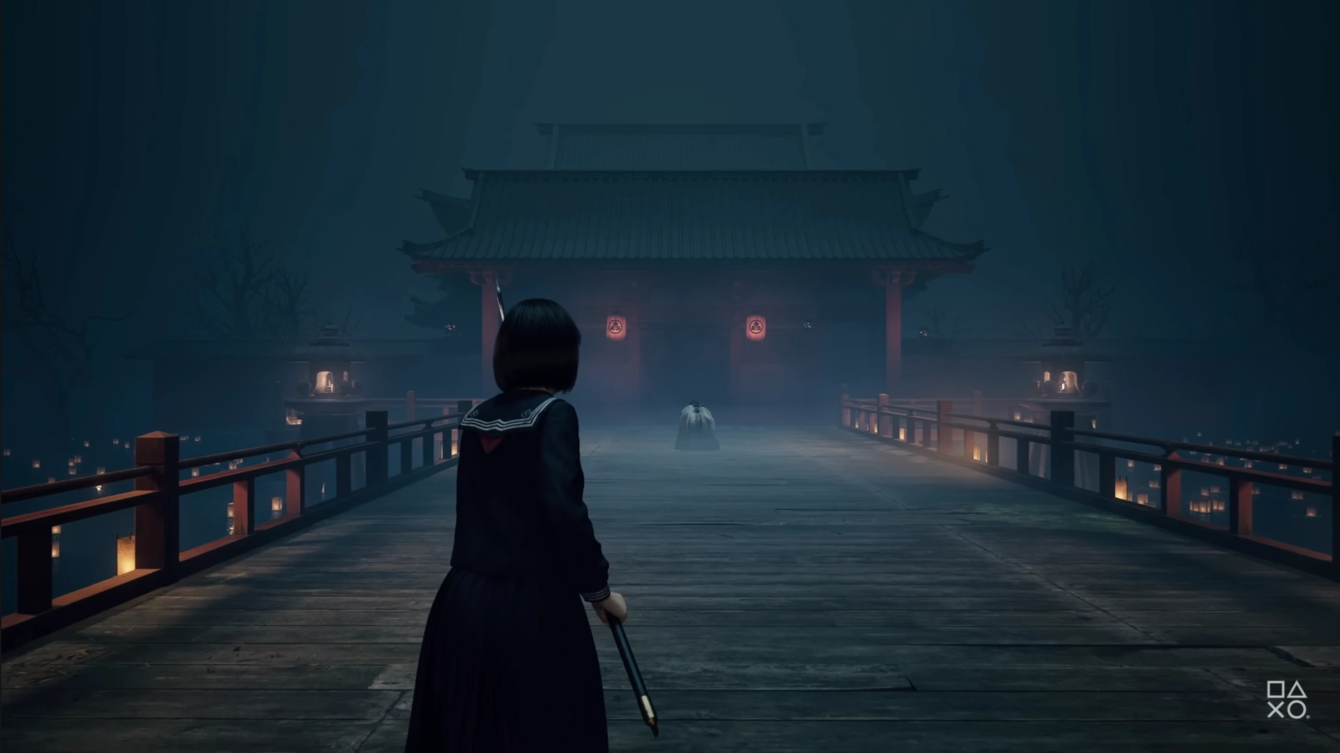 A scene from Silent Hill f, with Hinako Shimizu in a dark Japanese school uniform standing on a wooden bridge, looking towards a large, traditional Japanese gate lit by lanterns in the foggy darkness, with a shadowy figure presumed to be Sakuko visible near the gate.