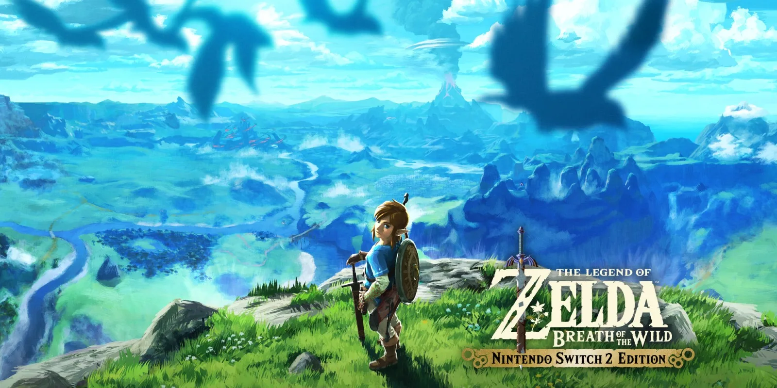 The iconic key art for The Legend of Zelda: Breath of the Wild – Switch 2 Edition, showing Link standing on a high cliff overlooking a sprawling, cel-shaded Hyrule, with mountains, rivers, and a volcano in the distance, under a bright blue sky with large bird silhouettes.